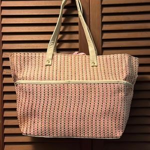 Woven pink straw totebag with cosmetic bag